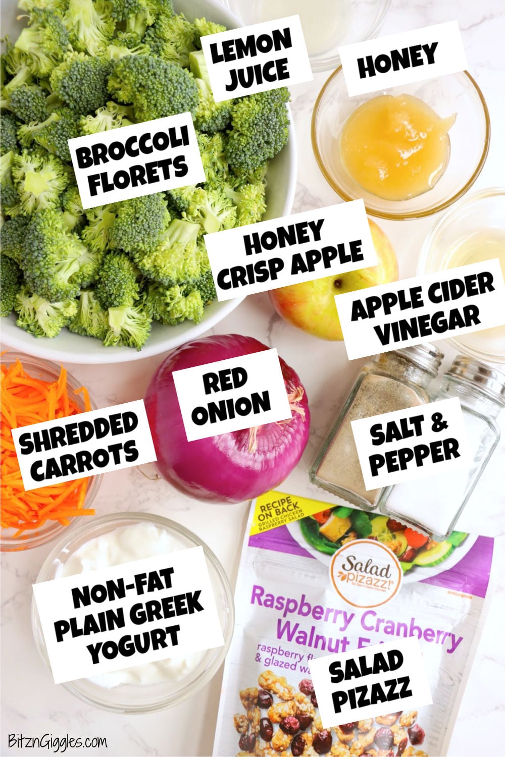 Ingredients for broccoli crunch salad including broccoli florets, apples, carrots, red onion, yogurt, and seasonings.
